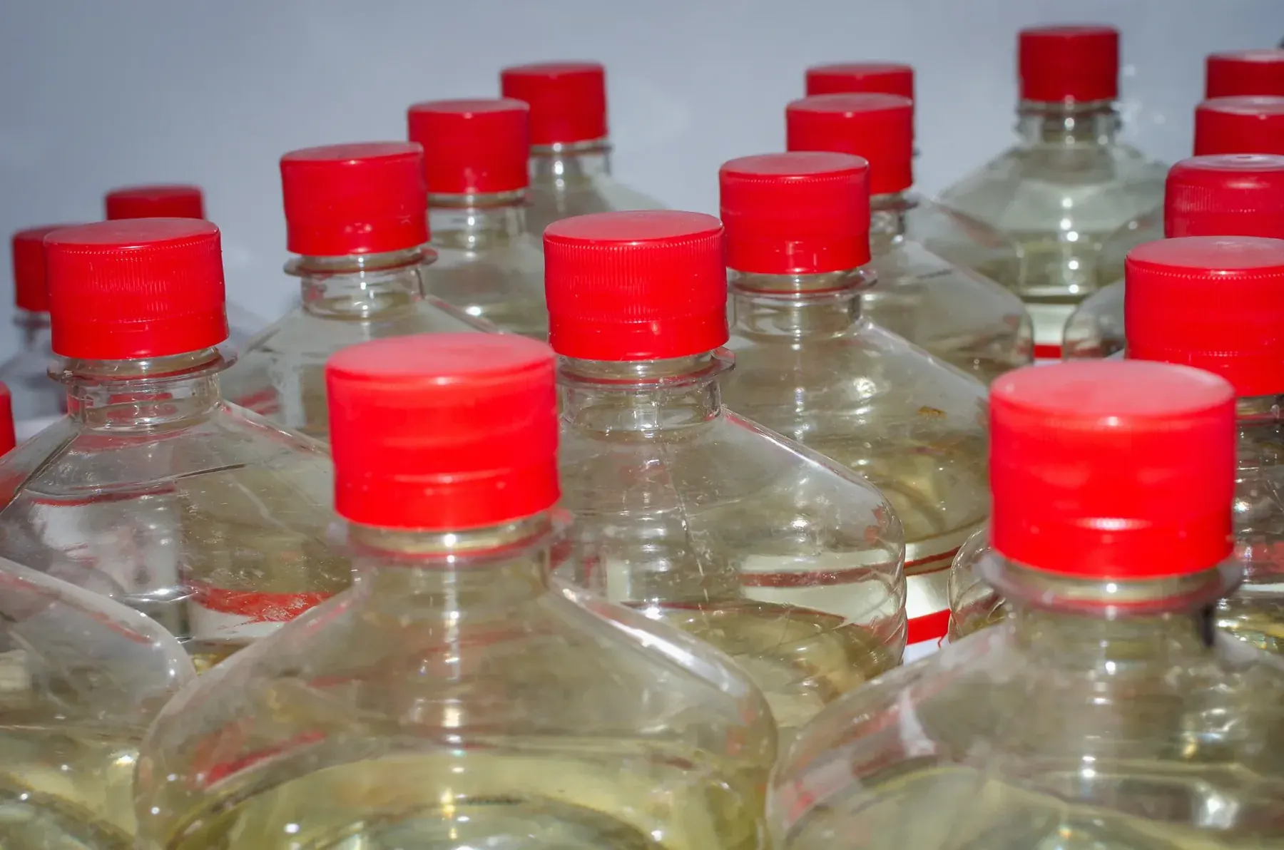 Acetone and solvent stored in plastic bottles.